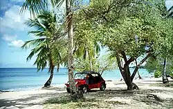 A Mini Moke on the beach at Speightstown, Barbados