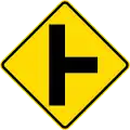 Uncontrolled side road junction on right
