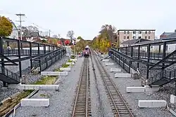 Construction of two railway platforms in an open cut