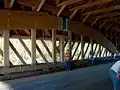 Interior featuring timber arch