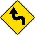 Reverse curve greater than 60 degrees, to left