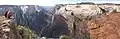 Enjoying the view from Observation Point, white cliffs of Cathedral Mountain to right