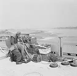 British engineers removing the charges which the Germans had set to blow the Nijmegen bridge, September 1944