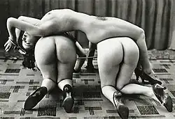 Three nude women, featuring bondage