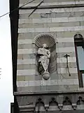 One of the marble statues on the second floor