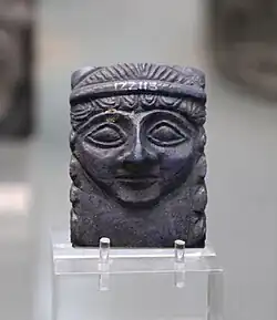 Lapis lazuli female portrait found with the cone in the same foundation deposit.[11]