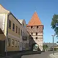 Mølleporten (1430) and Empiregården (1813)