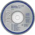 Standard "Blue Ring" RCA Victor label used on early US CDs from 1983 through 1987. Some later reissues of this label design change the ring and print color from blue to black.