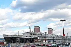 An ocean liner in a dockyard.