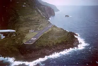 Saba's airport on Flat Point, with road winding up through Lower Hell's Gate