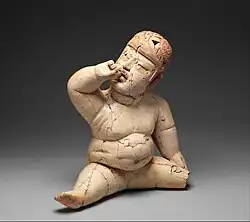 Seated figurine; 12th–9th century BC; painted ceramic; height: 34&nbsp;cm, width: 31.8&nbsp;cm, depth: 14.6&nbsp;cm; Metropolitan Museum of Art (New York City)