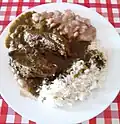 Meat stew with white rice and beans