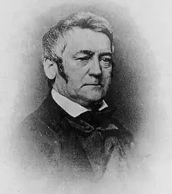 A portrait photograph of John Silva Meehan.