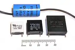 RC snubbers, a simple RC circuit with a small resistor (R) in series with a small film capacitor (C) in a common case