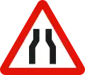 P-17 Road narrows on both sides