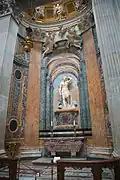 Statue of Saint Sebastian by Campi and Angels by Le Gros