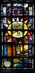 A late 20th-century window showing a graded range of colours. Ronald Whiting, Chapel Studios. Tattershall Castle, UK.