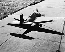 A VT-8 TBF landing on USS Saratoga off Guadalcanal, August 1942