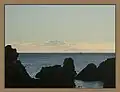Te Raekaihau Point rock pools, looking toward the mountains of the South Island
