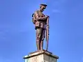 Detail of the sculpture atop the plinth