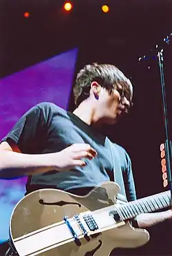 Musician Tom DeLonge performing in 2004.