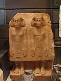 Group statue of Sehotepibreankh-Nedjem (left) and Nebpu (right)