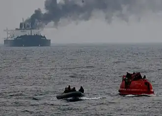 Sailors from USS "Philippine Sea" rescue the crew of the "Brillante Virtuoso"