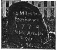 Peleg Arnold's 1774 milestone on old Great Road across from the Quaker Meeting House