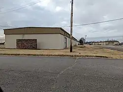 Six tan warehouses