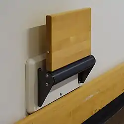 Folding seat in a corridor in NÄL hospital, Sweden