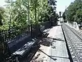 Northbound view of the eastern platform, March 2015. Built to serve Sydney-Melbourne passenger trains on the original standard gauge line, the platform was demolished and replaced by a new platform to the west of the existing station as a part of Inland Rail works[20]