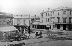 The street (running left to right), 1867