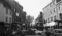 The building is on the left in this 1960s view to the north