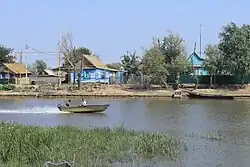River in the area with buildings nearby