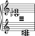{
\override Score.TimeSignature #'stencil = ##f
\new PianoStaff <<
\new Staff = "up" \relative c'' {
\time 4/4
s1
}
\new Staff = "down" \relative c' {
\time 4/4
\voiceOne
\repeat tremolo 16 {
{
\change Staff = "up"
\voiceTwo
<bes es g>32
}
{
\change Staff = "down"
\voiceOne
<a cis e>32
}
}
}
>>
}